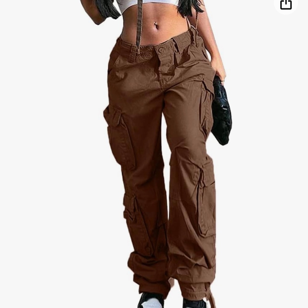 Brown Baggy Cargo size XL Pants (used) two belt loops broken
Discolored, washed